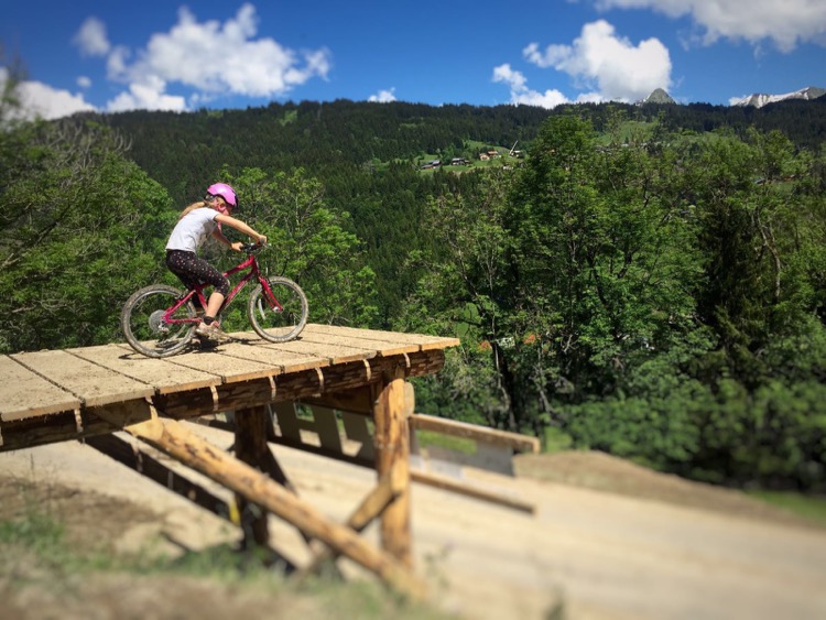 Iz hitting one of the Crankworx road gaps. I told you she was getting good ;)