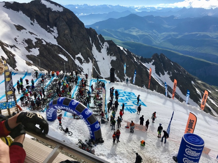 Megavalanche 2018 ebike riders lining up at Pic Blanc for their race start. 